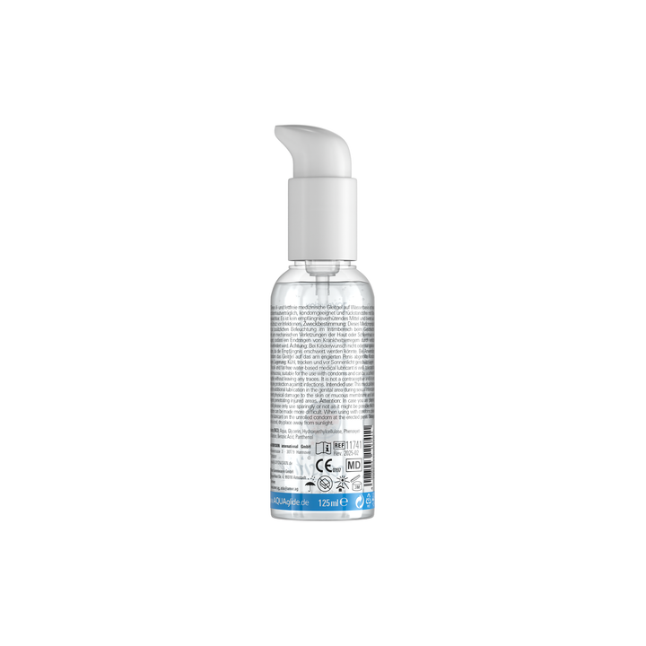 Clear spray bottle with a white pump on a white background